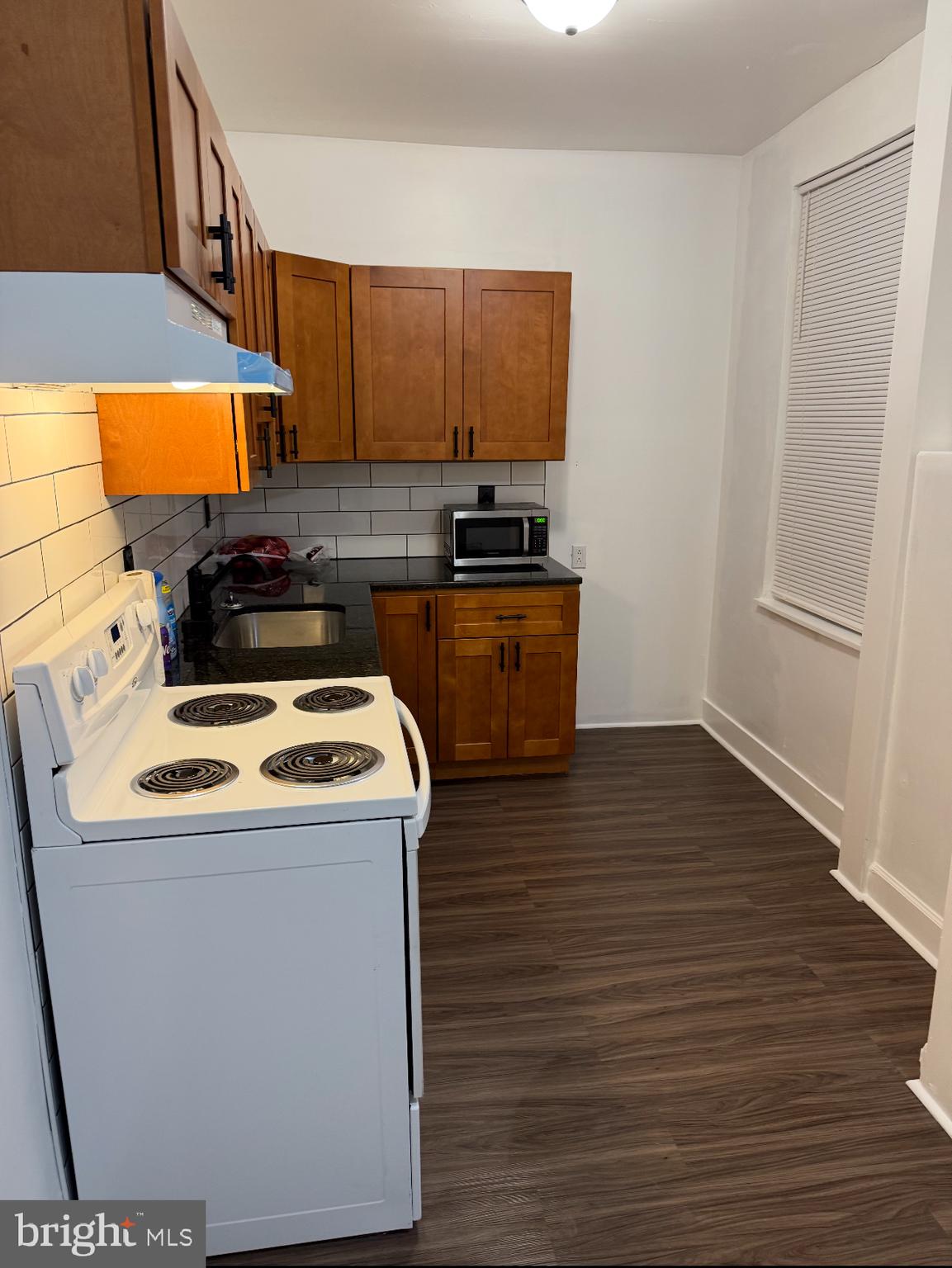 2715 Hope Street Philadelphia, PA 19133 - Photo 4 of 15 a view of kitchen and wooden floor