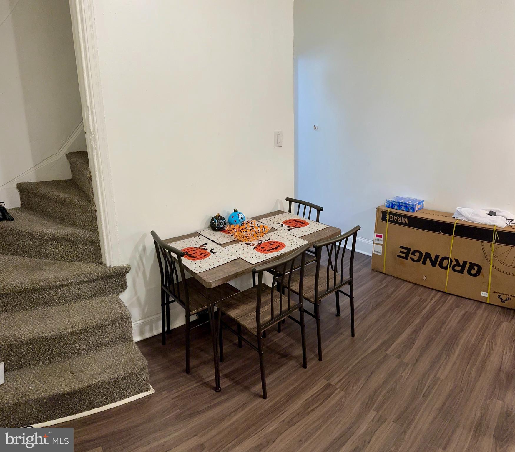 2715 Hope Street Philadelphia, PA 19133 - Photo 6 of 15 a dining room with furniture and wooden floor