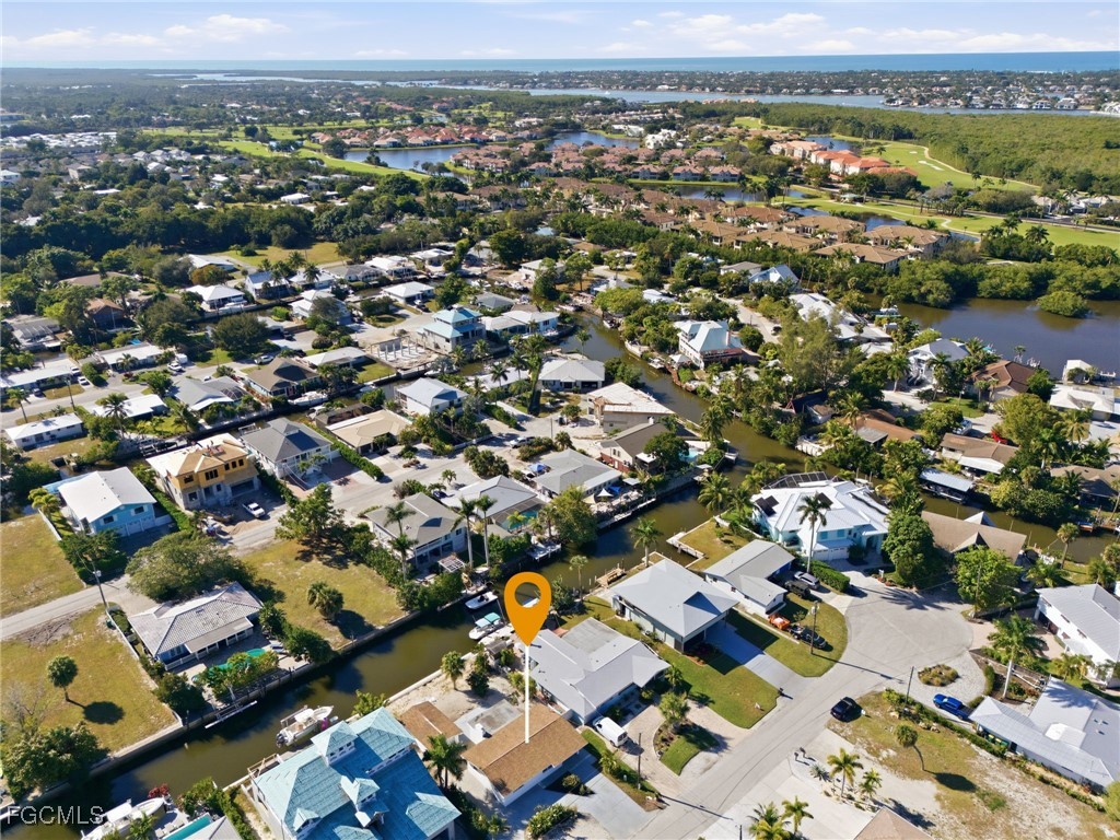 2754 Shoreview Drive Naples, FL 34112 - Photo 13 of 18 an aerial view of a city with lots of residential buildings