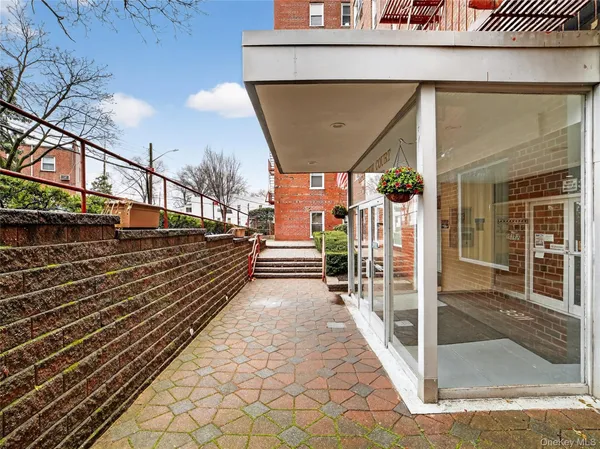 a view of a balcony with car parked