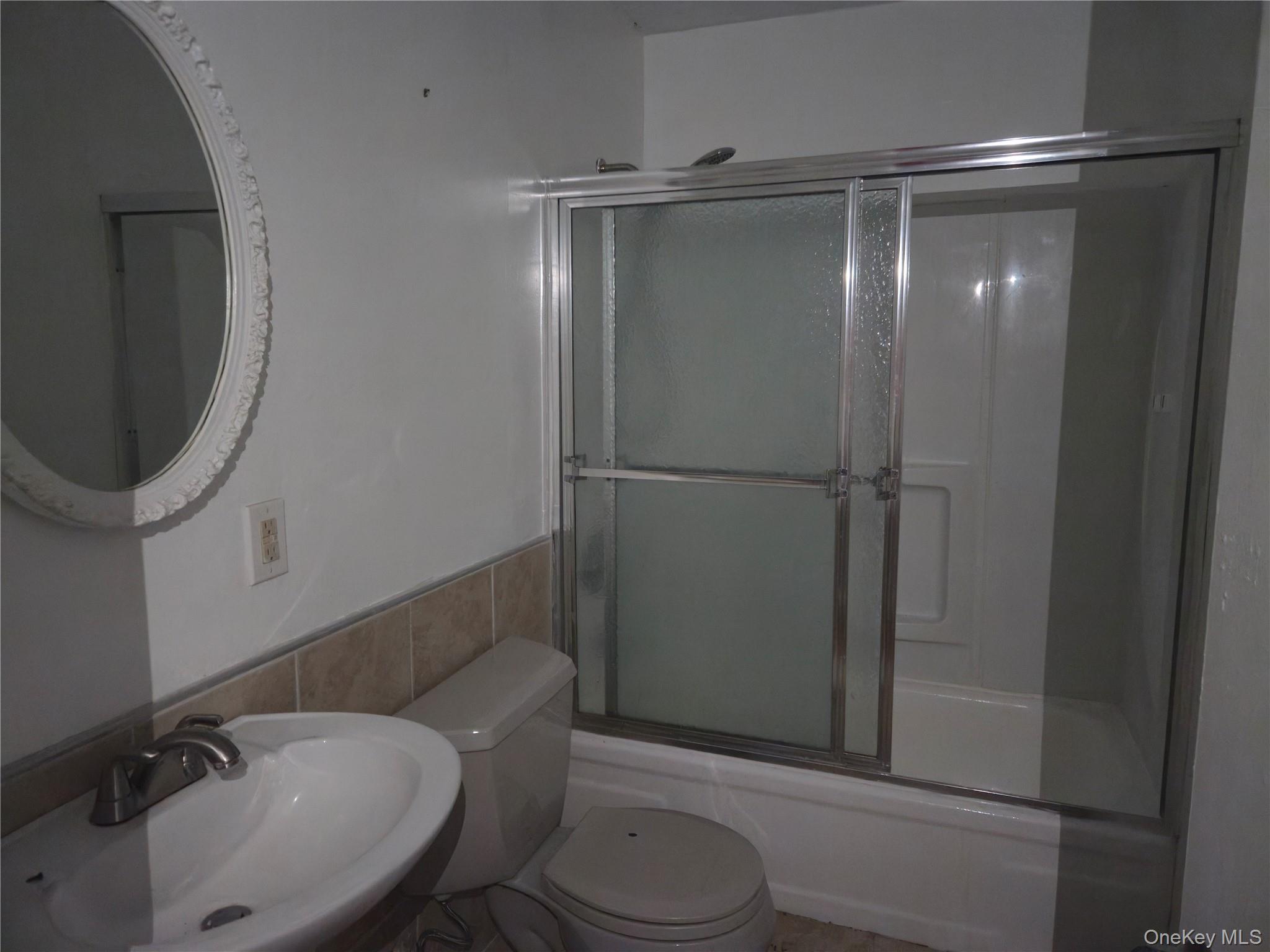 43 Glenmere Homesites Road Florida, NY 10921 - Photo 13 of 30 Full bathroom featuring enclosed tub / shower combo and tile walls
