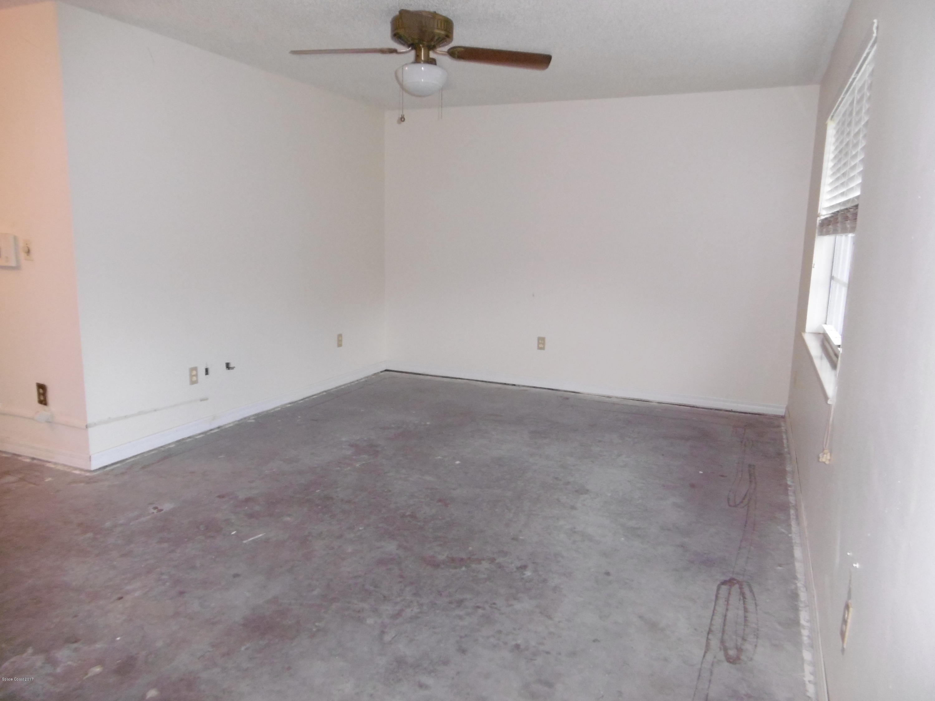 1340 Creel Road Northeast Palm Bay, FL 32905 - Photo 2 of 18 Living Room
