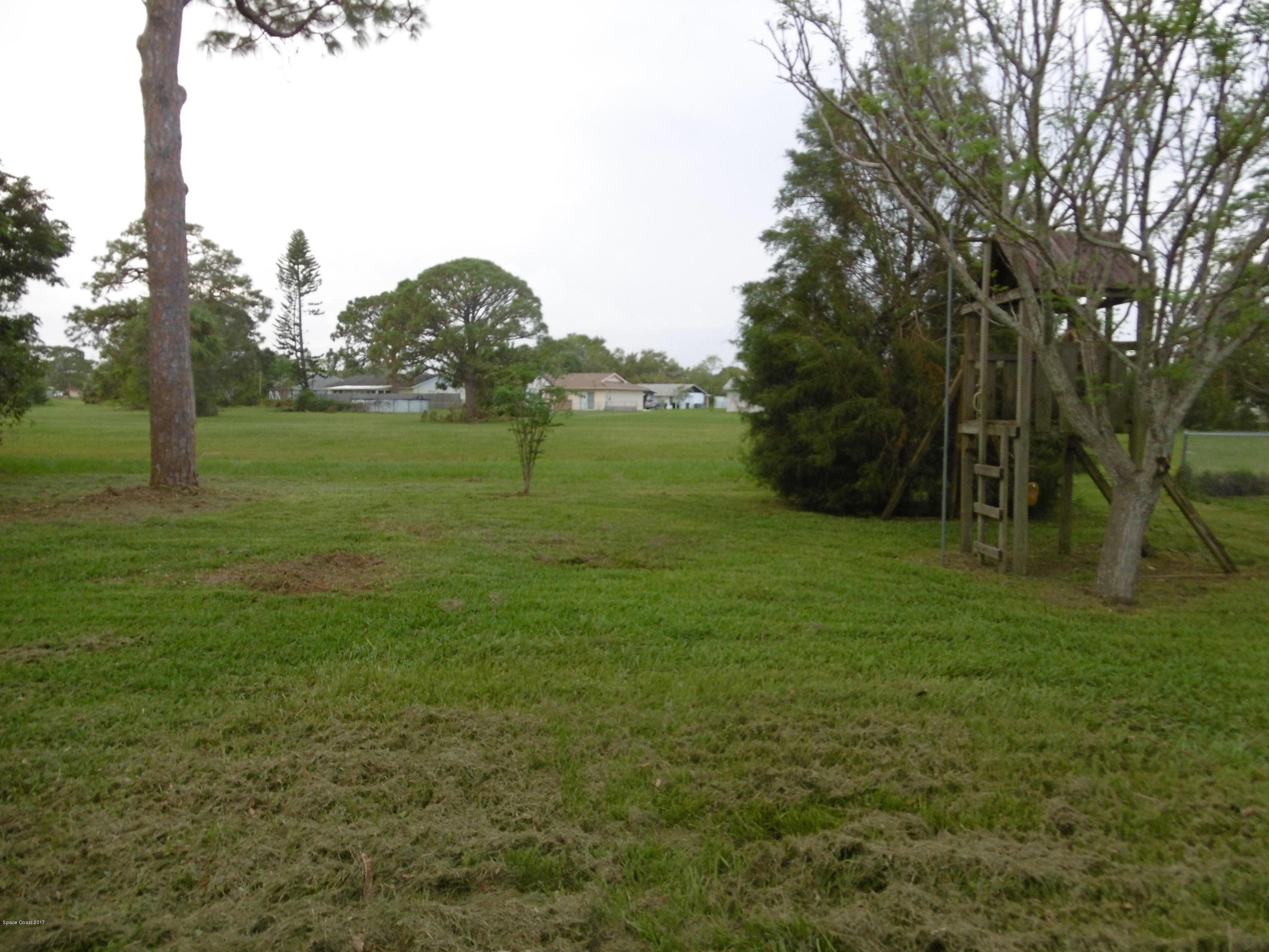 1340 Creel Road Northeast Palm Bay, FL 32905 - Photo 16 of 18 backyard view