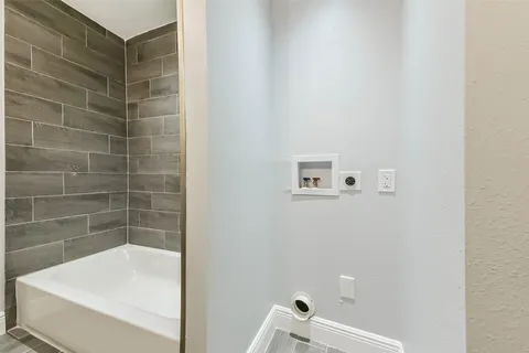 a bathroom with a bathtub