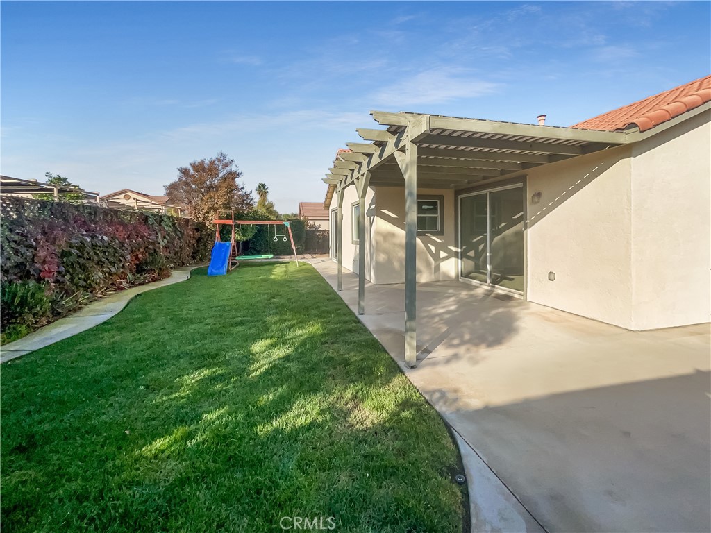 3429 Catalina Avenue Hemet, CA 92545 - Photo 5 of 20 a view of a house with a yard