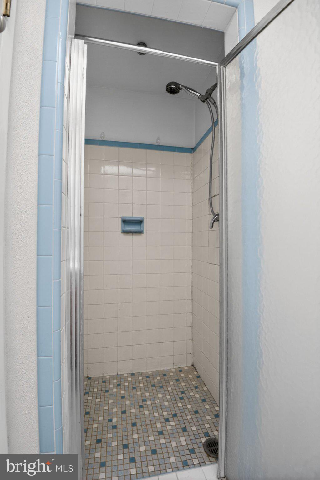 4026 Gideon Road Brookhaven, PA 19015 - Photo 12 of 27 Modern shower with tiled accents.