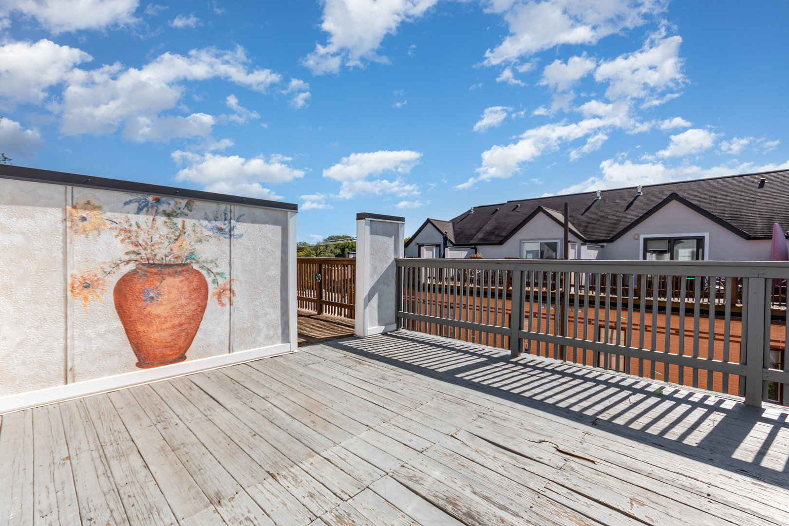 1022 Alexander Lane Oak Park, IL 60302 - Photo 9 of 19 a view of a house with a roof deck