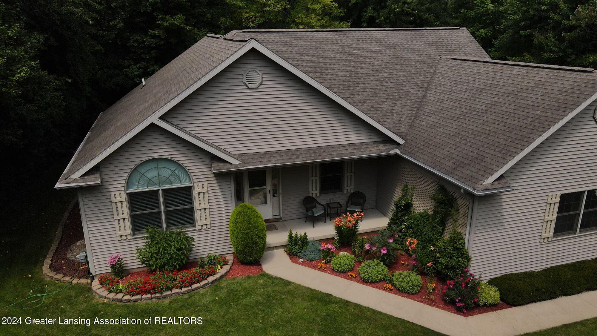 3848 Sandhill Road Lansing, MI 48911 - Photo 2 of 33 Aerial View of House & Landscaping