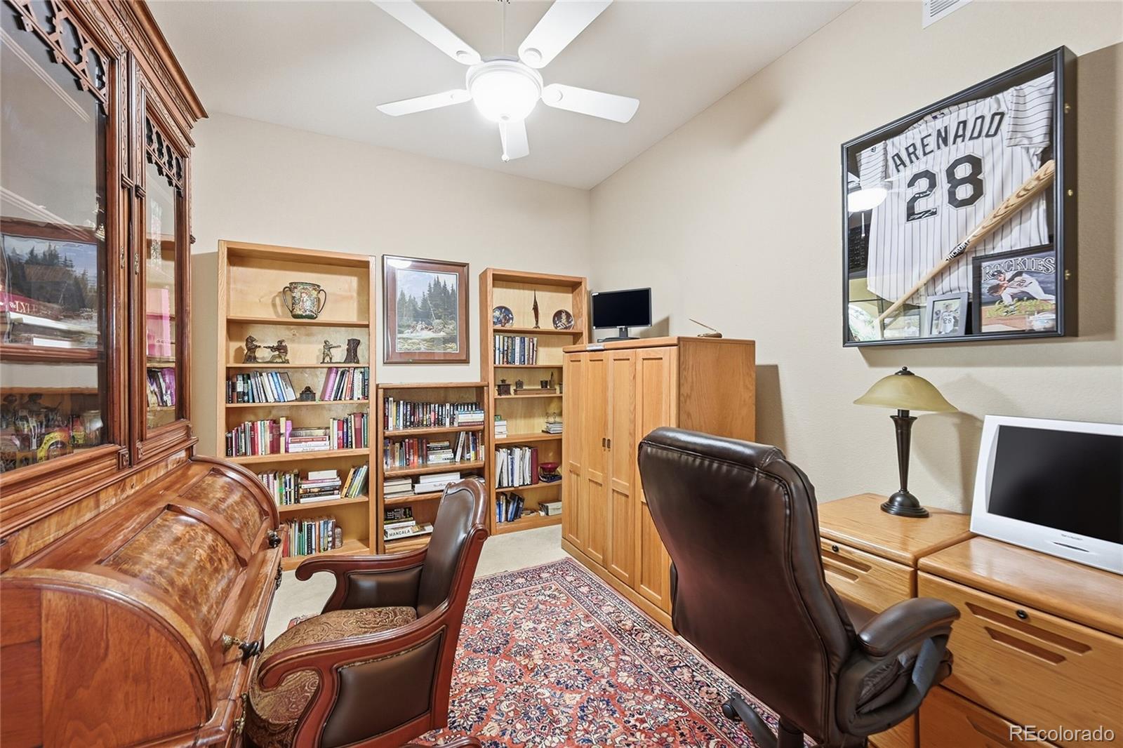2626 Pemberly Avenue Highlands Ranch, CO 80126 - Photo 15 of 49 a workspace with furniture
