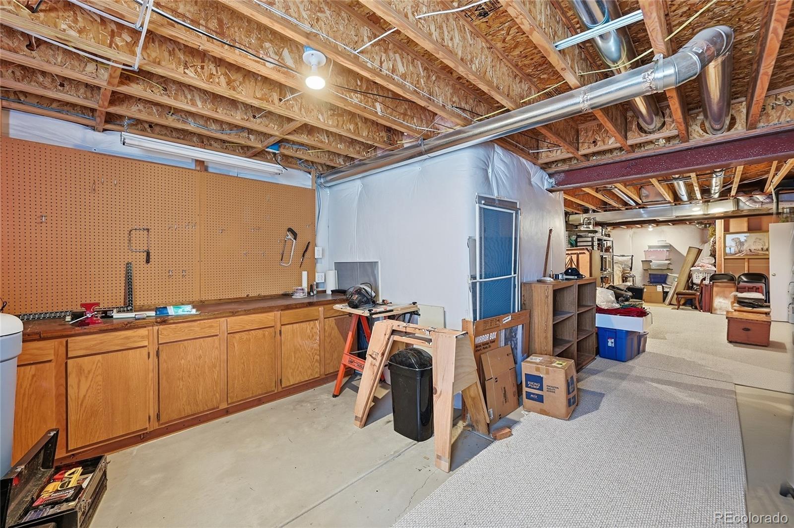 2626 Pemberly Avenue Highlands Ranch, CO 80126 - Photo 24 of 49 a view of a room with gym equipment