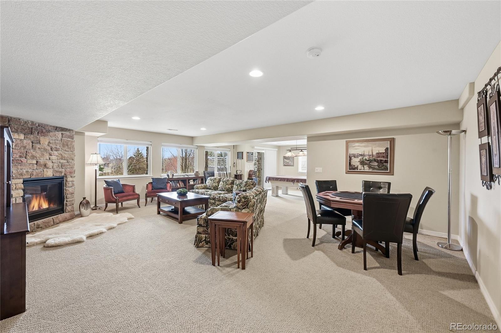 2626 Pemberly Avenue Highlands Ranch, CO 80126 - Photo 25 of 49 a view of a livingroom with furniture and window