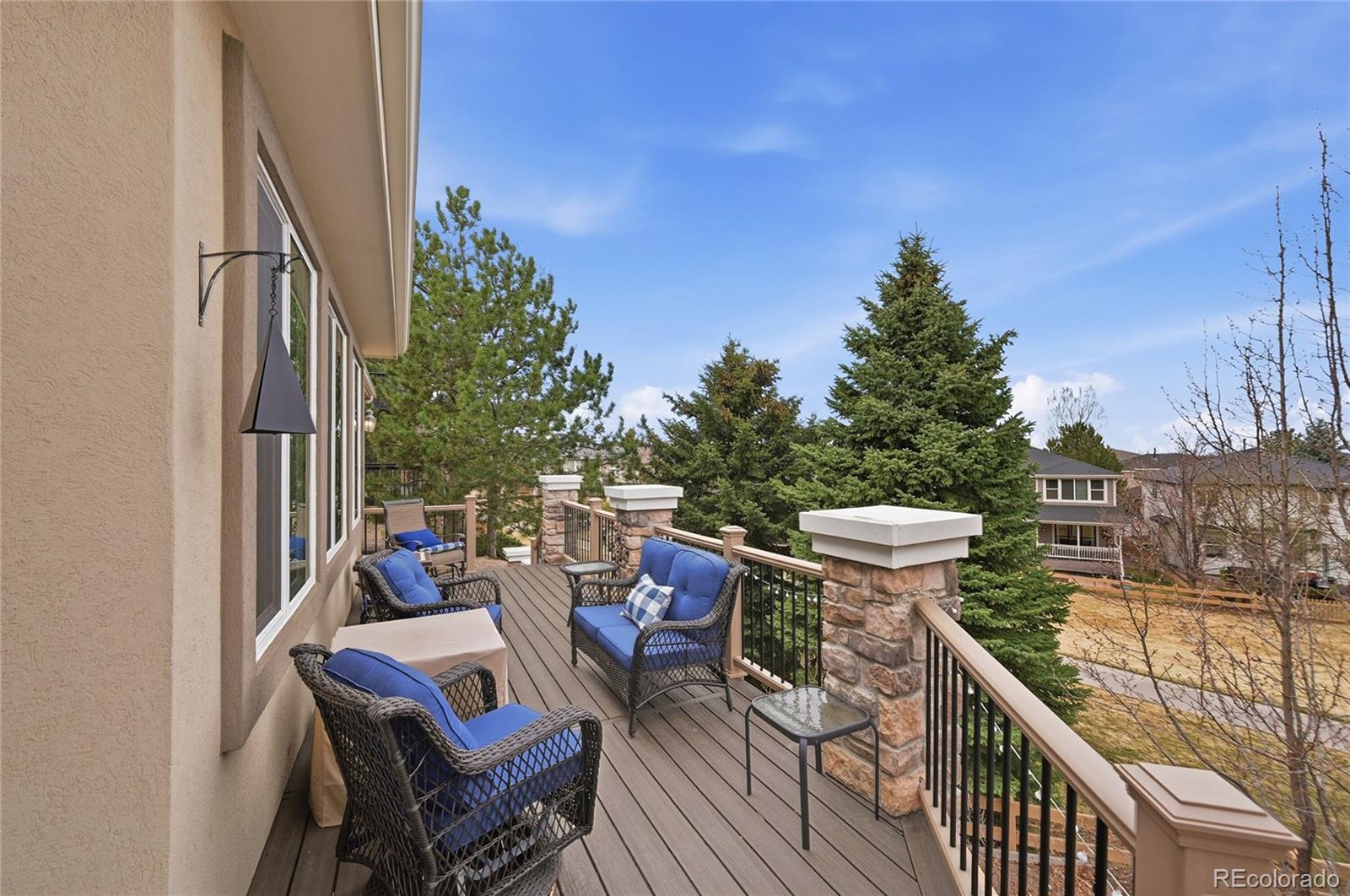 2626 Pemberly Avenue Highlands Ranch, CO 80126 - Photo 31 of 49 a view of a balcony with chairs