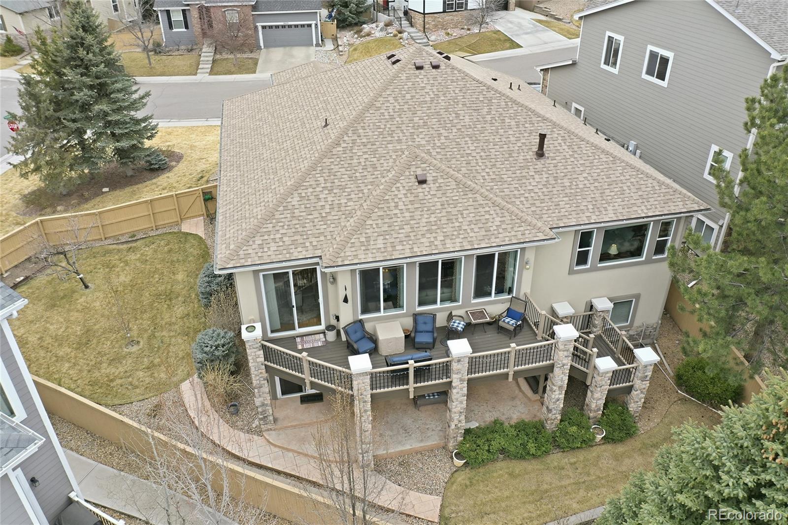 2626 Pemberly Avenue Highlands Ranch, CO 80126 - Photo 42 of 49 aerial view of a house with outdoor seating