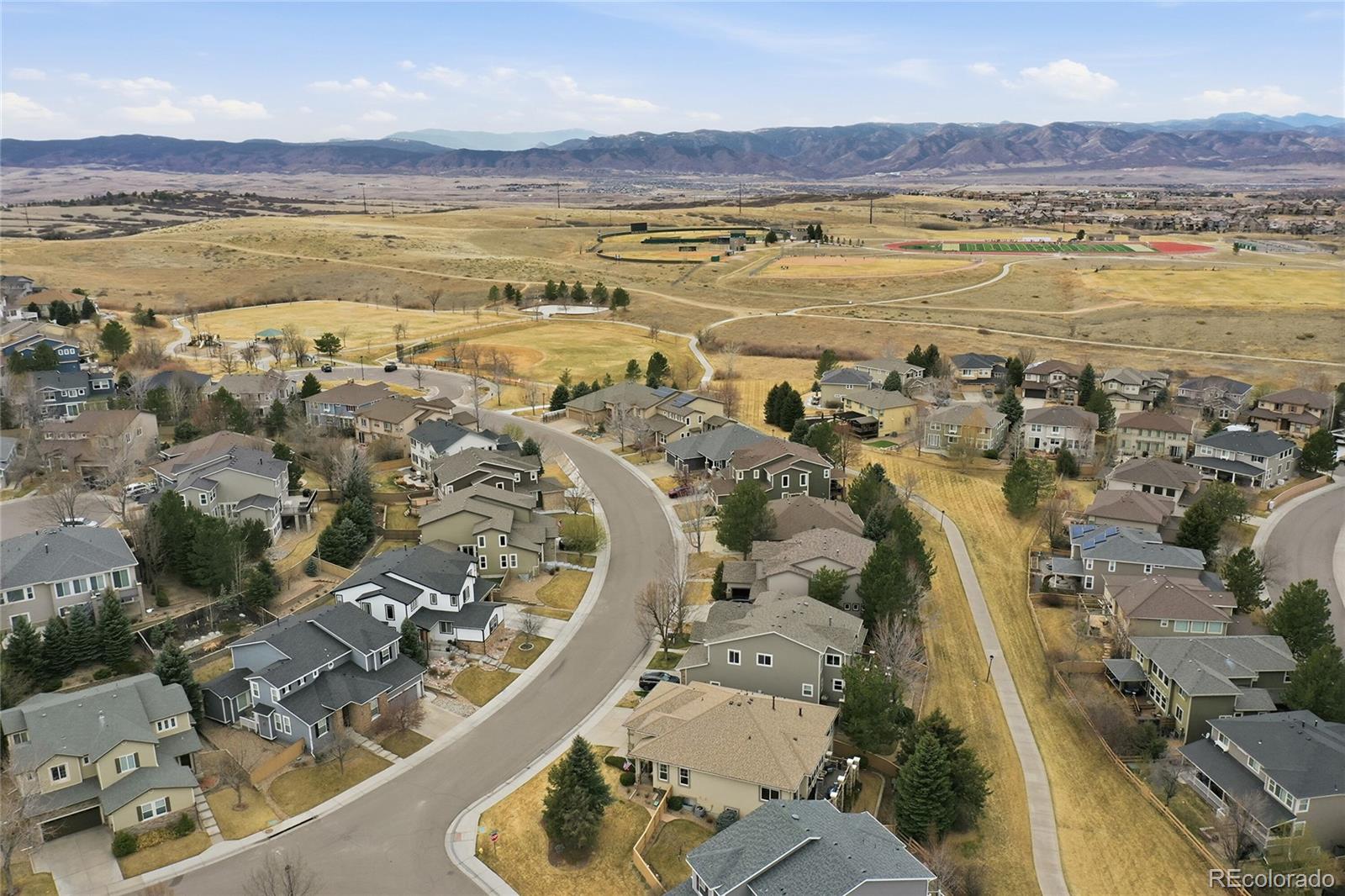 2626 Pemberly Avenue Highlands Ranch, CO 80126 - Photo 44 of 49 a view of an ocean and a mountain