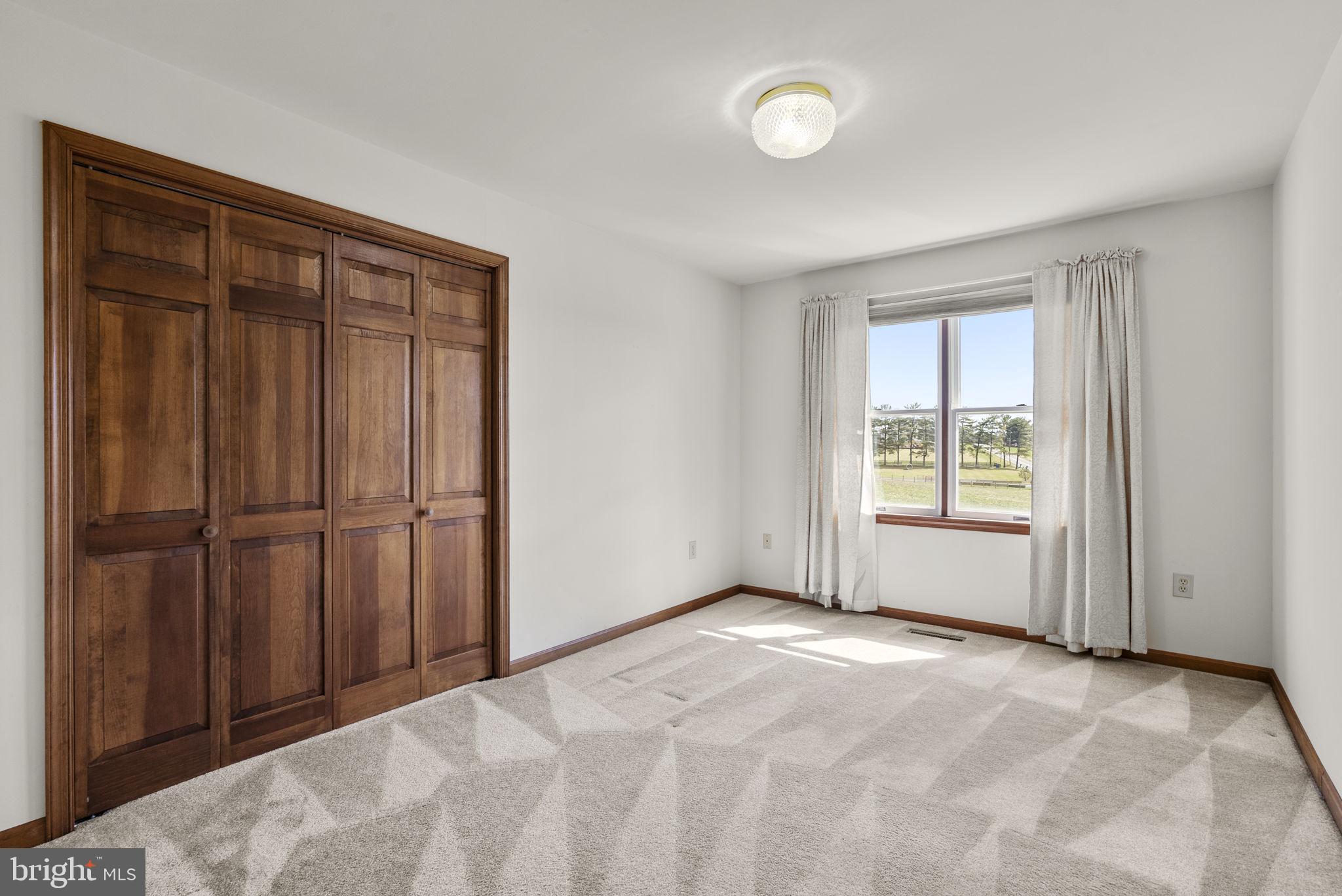 9224 Ball Road Ijamsville, MD 21754 - Photo 29 of 56 a view of a livingroom with a staircase