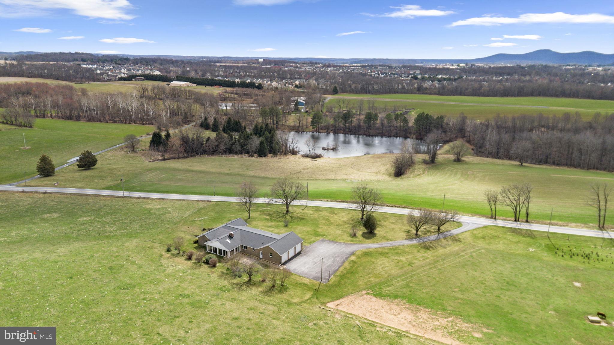 9224 Ball Road Ijamsville, MD 21754 - Photo 3 of 56 a view of a lake with a mountain