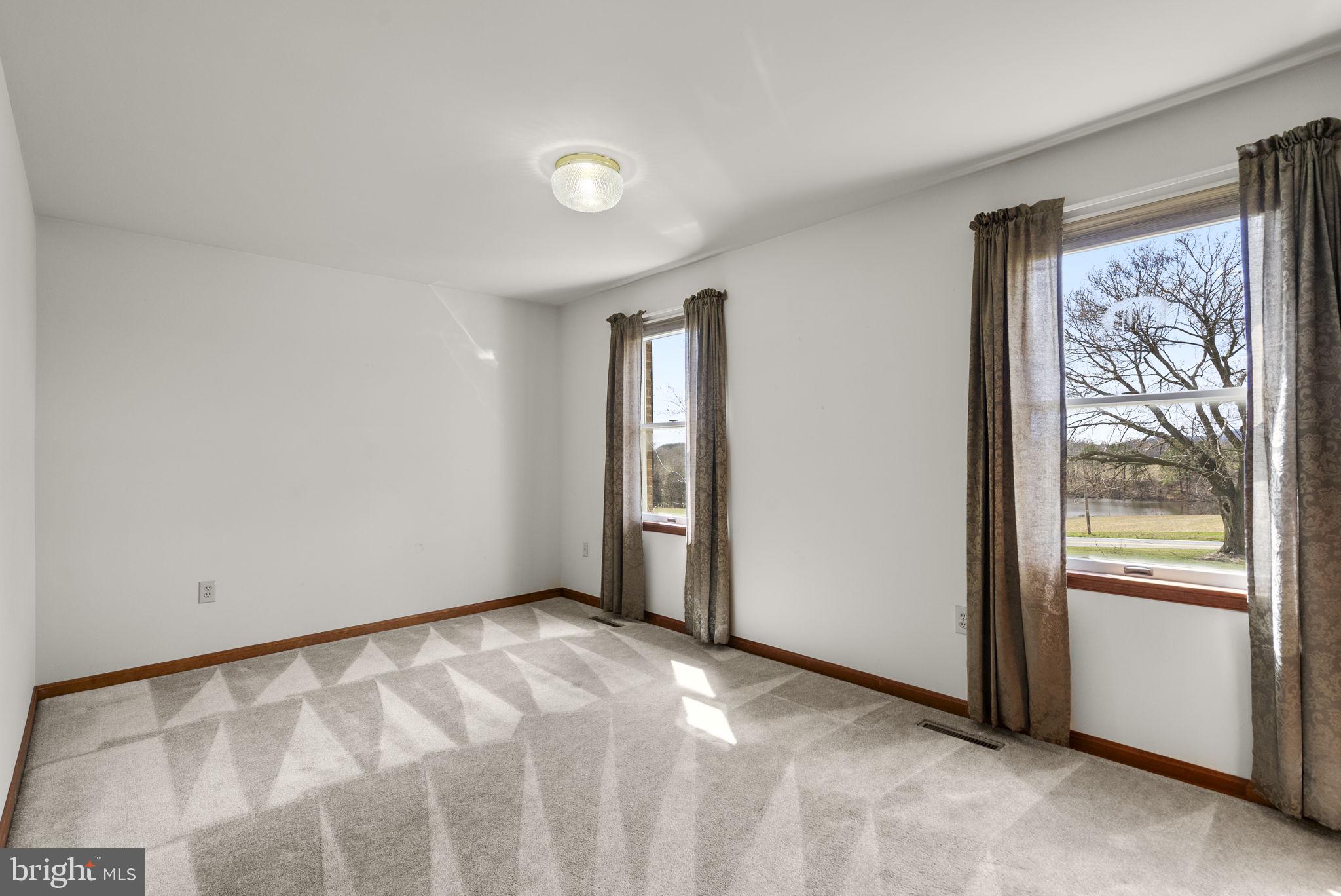 9224 Ball Road Ijamsville, MD 21754 - Photo 34 of 56 a view of an empty room and window