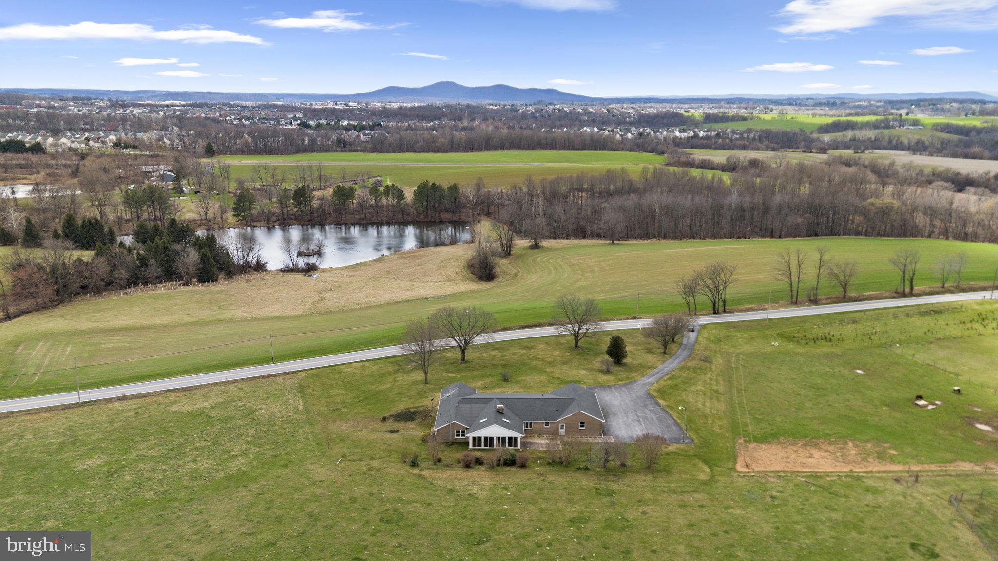 9224 Ball Road Ijamsville, MD 21754 - Photo 47 of 56 a view of a lake with a mountain