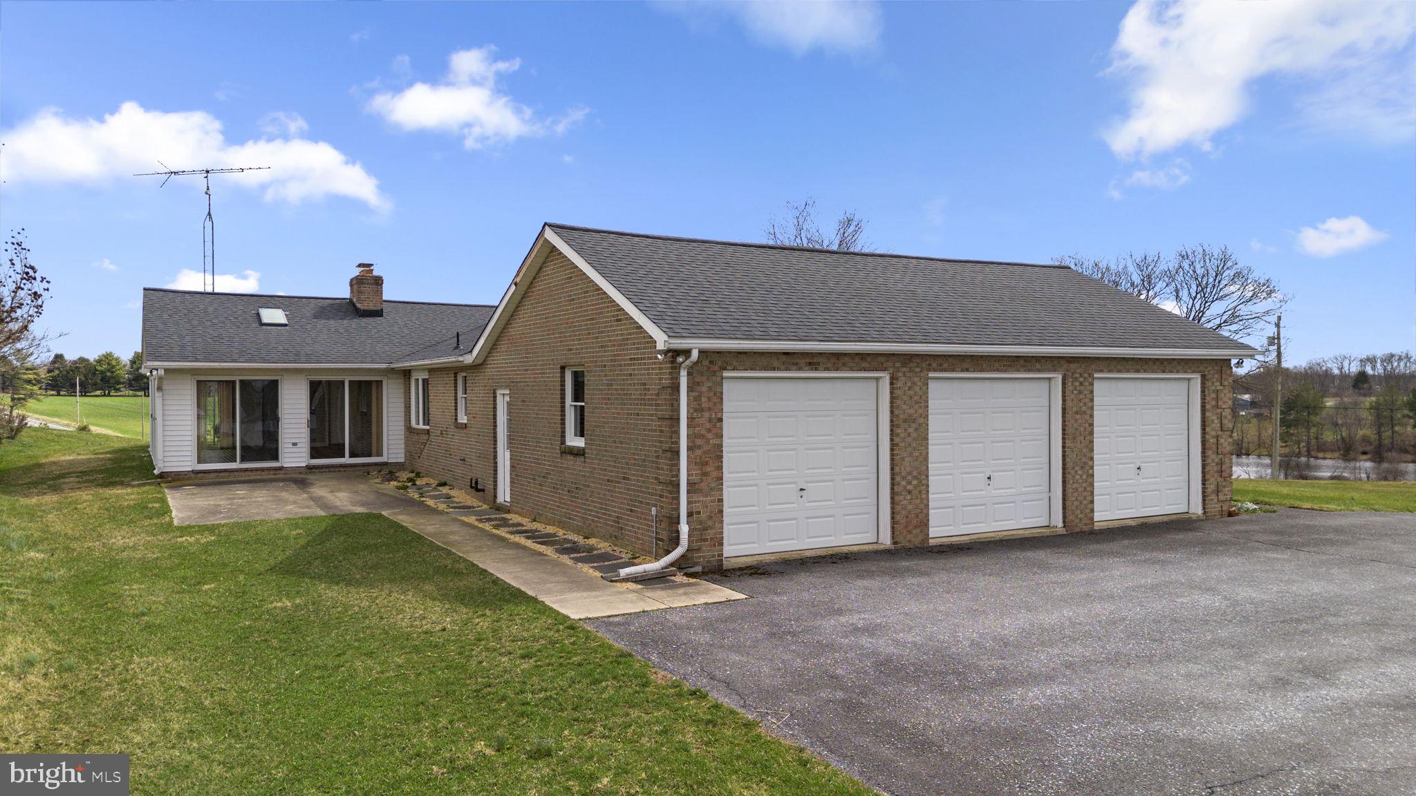 9224 Ball Road Ijamsville, MD 21754 - Photo 51 of 56 a front view of a house with a yard