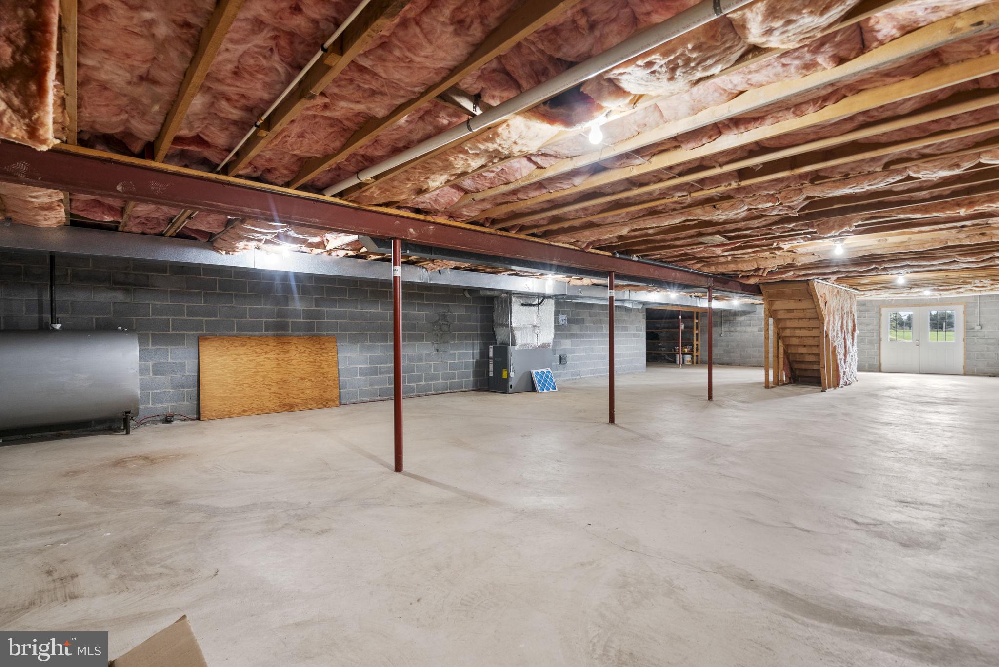 9224 Ball Road Ijamsville, MD 21754 - Photo 52 of 56 a view of an empty room with a fireplace