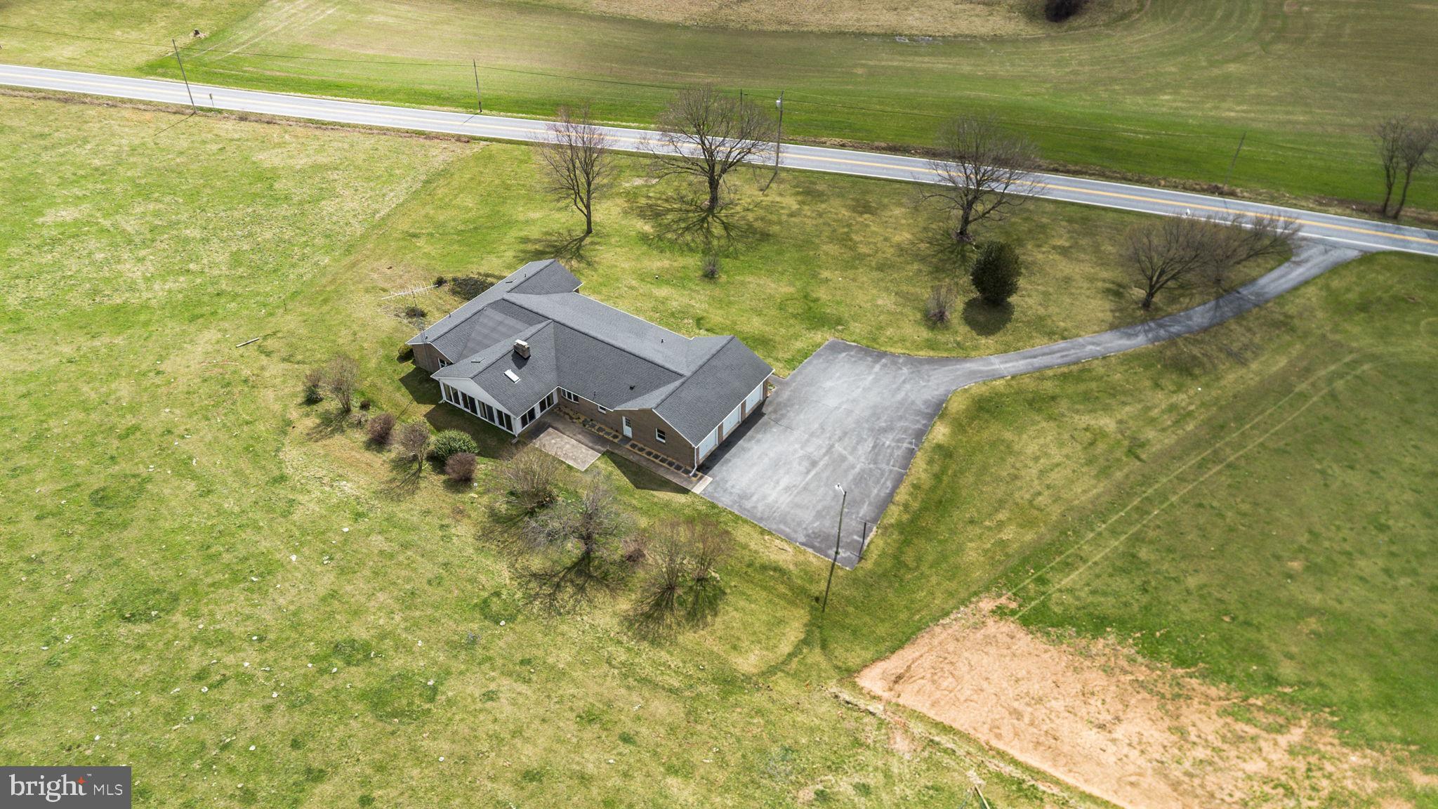 9224 Ball Road Ijamsville, MD 21754 - Photo 55 of 56 a view of a swimming pool with a yard