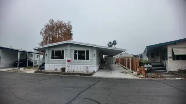 a view of a house with a patio