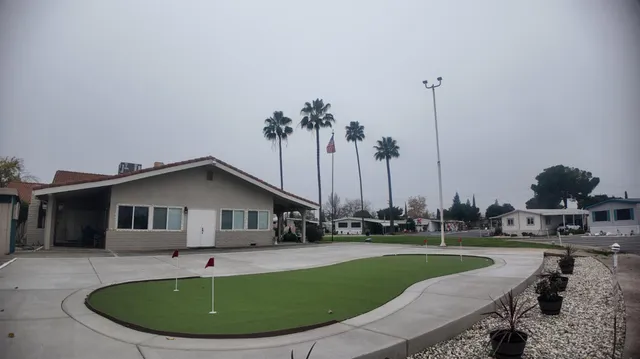 a view of a house with a swimming pool