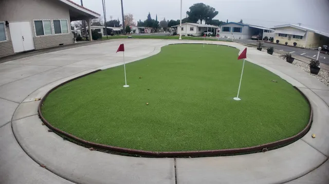 a view of a swimming pool with outdoor seating