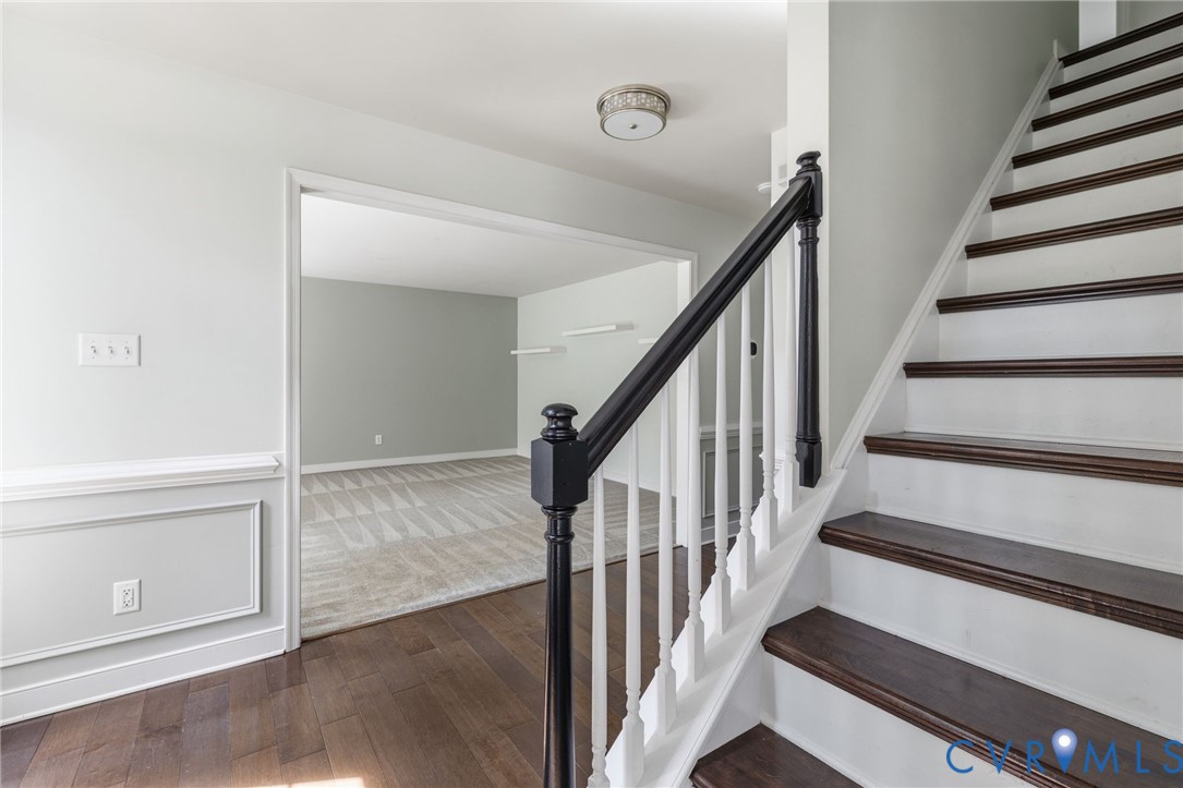 13524 Mountcastle Road Chesterfield, VA 23832 - Photo 3 of 44 Staircase with dark wood-finish treads and risers,