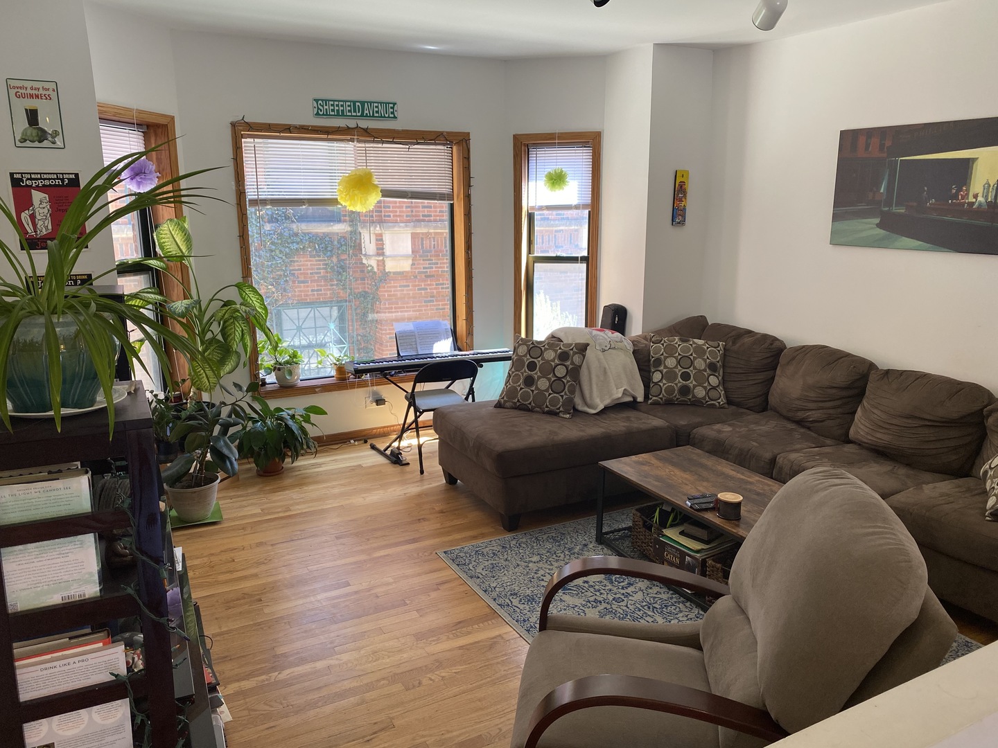 632 West Patterson Avenue, Unit 1N Chicago, IL 60613 - Photo 4 of 17 a living room with furniture and a large window