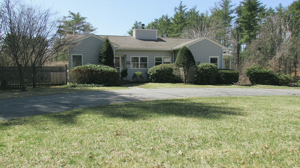 288 Linebrook Road Ipswich, MA 01938 - Photo 1 of 26 a front view of a house with a yard