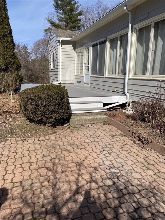 288 Linebrook Road Ipswich, MA 01938 - Photo 12 of 26 a front view of a house with a yard