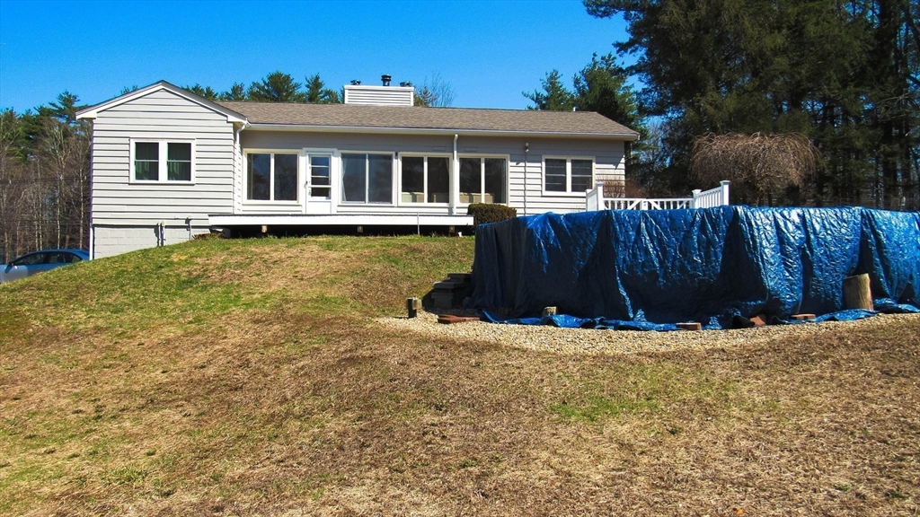 288 Linebrook Road Ipswich, MA 01938 - Photo 13 of 26 a front view of a house with a yard