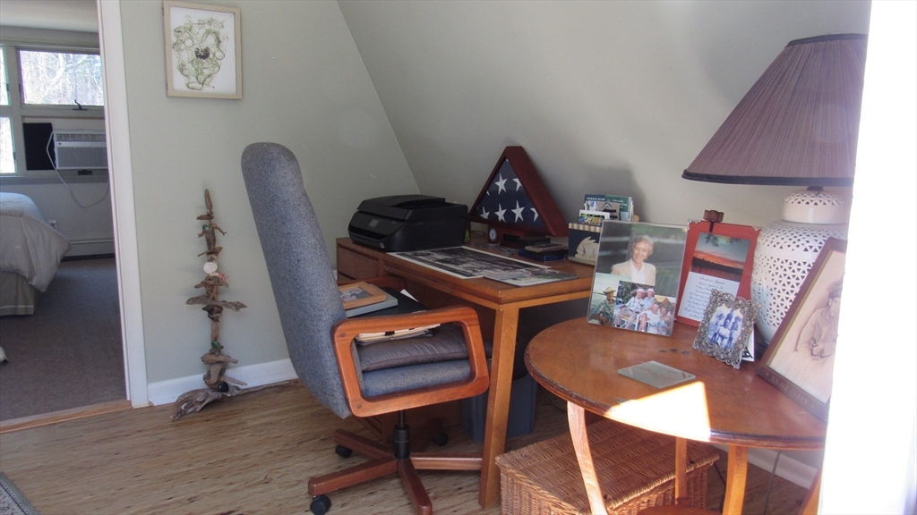 288 Linebrook Road Ipswich, MA 01938 - Photo 16 of 26 a view of a workspace with furniture and wooden floor