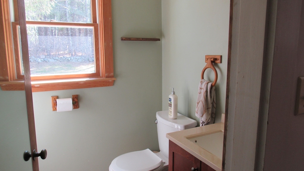 288 Linebrook Road Ipswich, MA 01938 - Photo 10 of 26 a bathroom with a sink and toilet