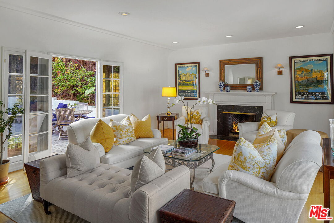 10614 Le Conte Avenue Los Angeles, CA 90024 - Photo 2 of 33 a living room with furniture fireplace and a large window