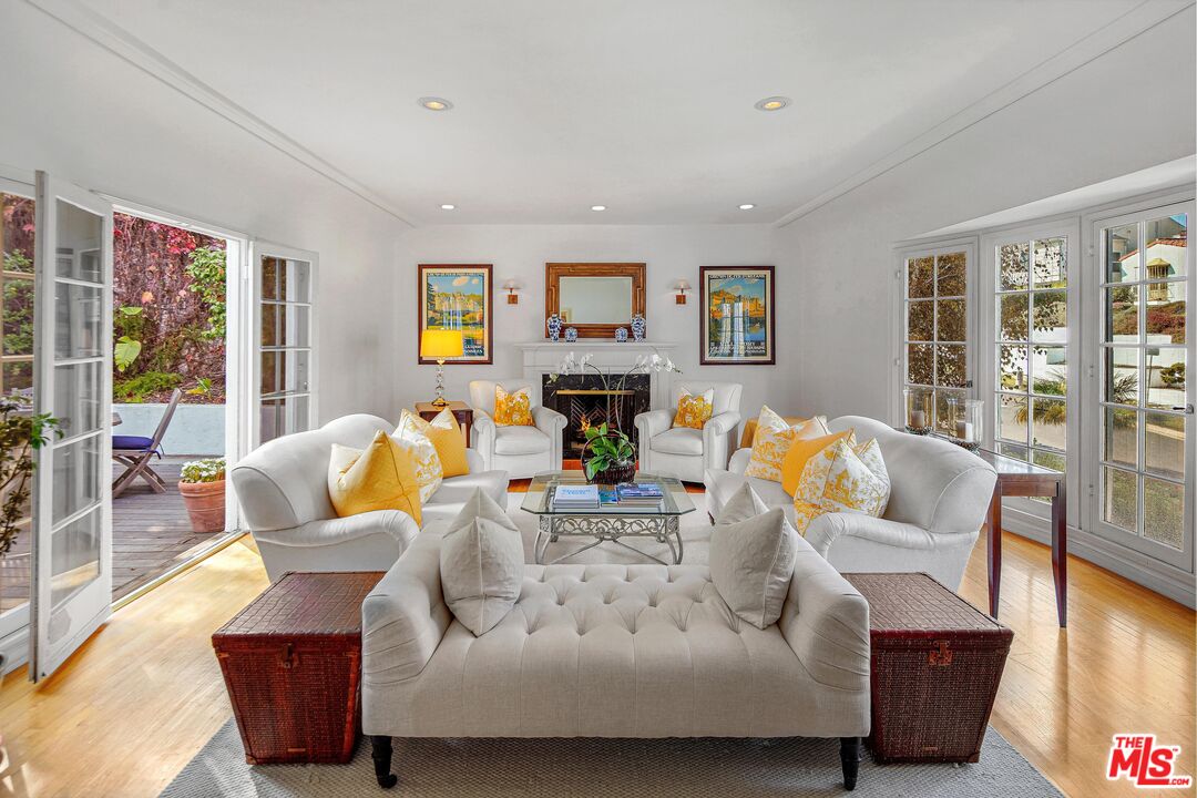 10614 Le Conte Avenue Los Angeles, CA 90024 - Photo 3 of 33 a living room with fireplace furniture and a wooden floor