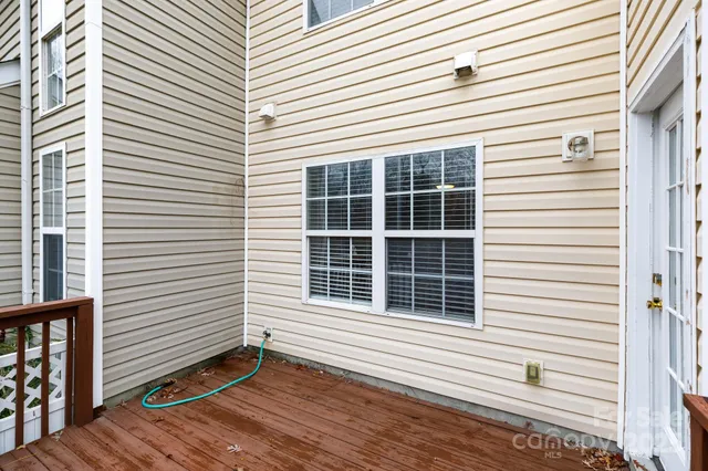 a view of a backyard of the house