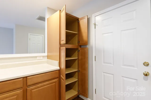 a bathroom with a bathtub and a sink