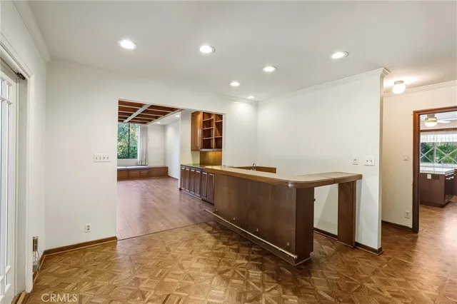 a view of entryway with kitchen