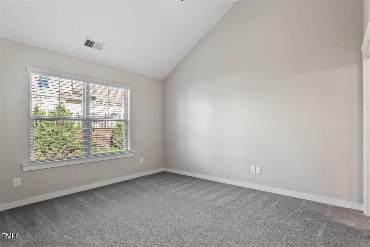 7822 Allscott Way Raleigh, NC 27612 - Photo 20 of 33 an empty room with a window