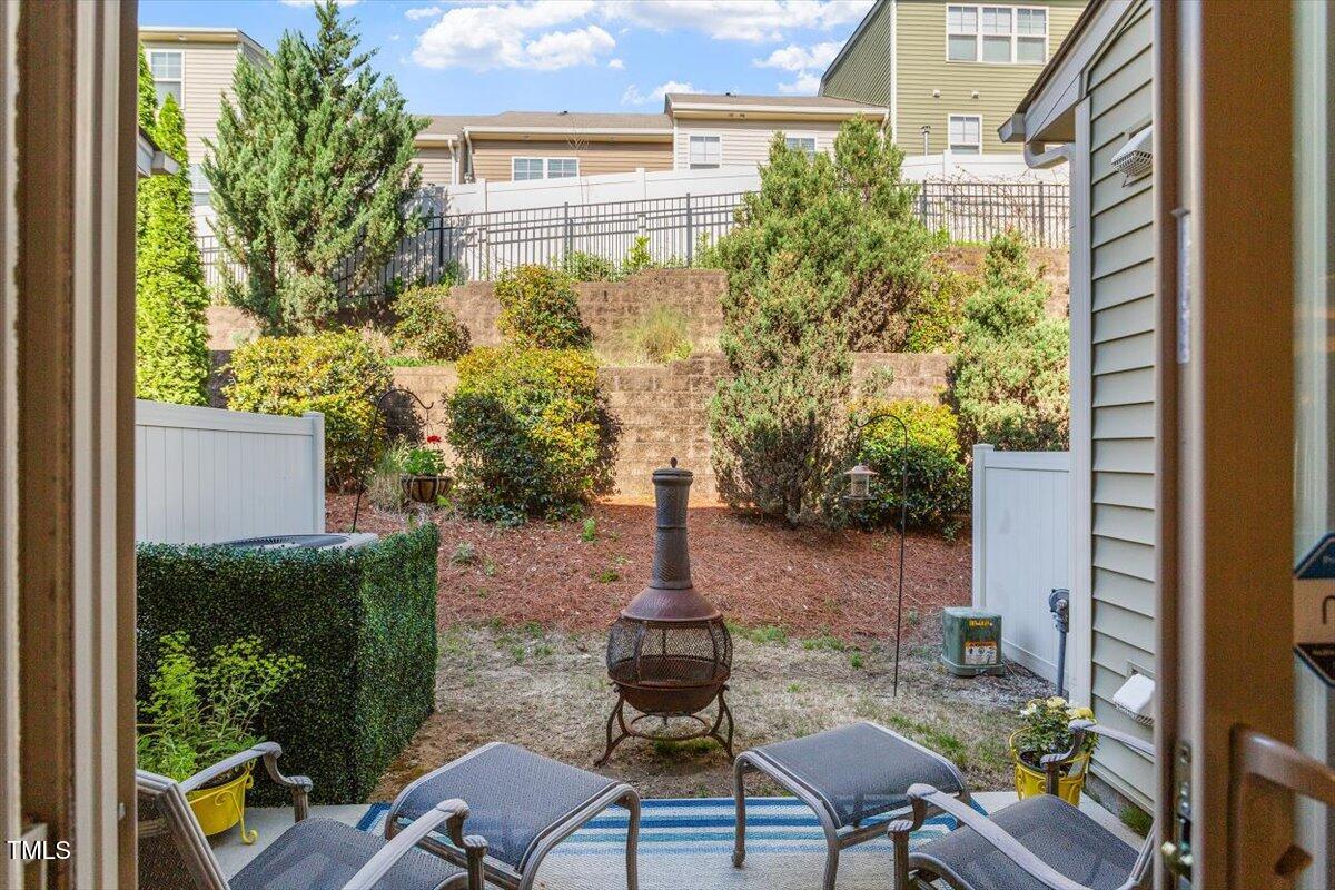7822 Allscott Way Raleigh, NC 27612 - Photo 25 of 33 a view of a patio in backyard