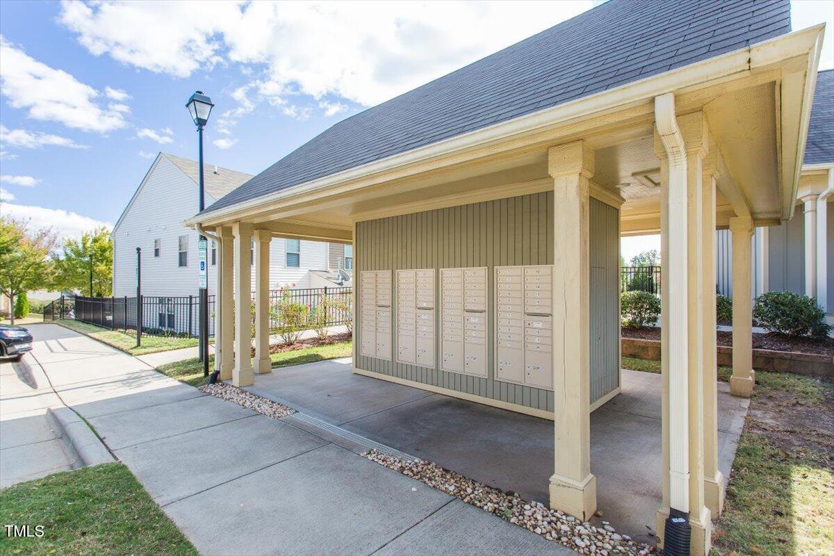 7822 Allscott Way Raleigh, NC 27612 - Photo 31 of 33 a view of a house with a porch