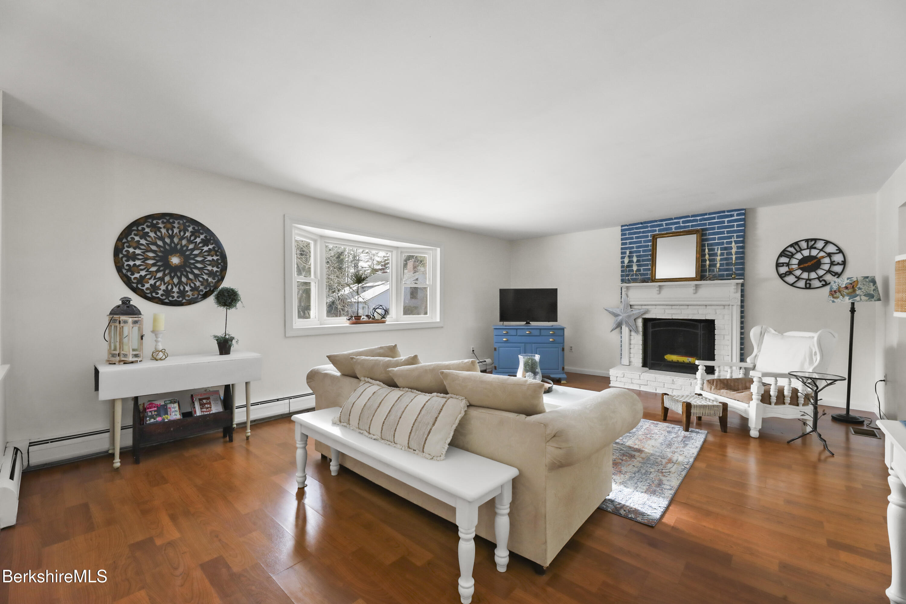 11 Brookside Drive Pittsfield, MA 01201 - Photo 3 of 43 a living room with furniture and a fireplace