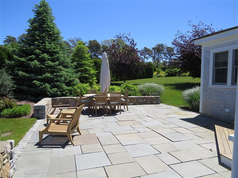 247 Seapine Road North Chatham, MA 02650 - Photo 8 of 27 a view of a backyard with sitting area