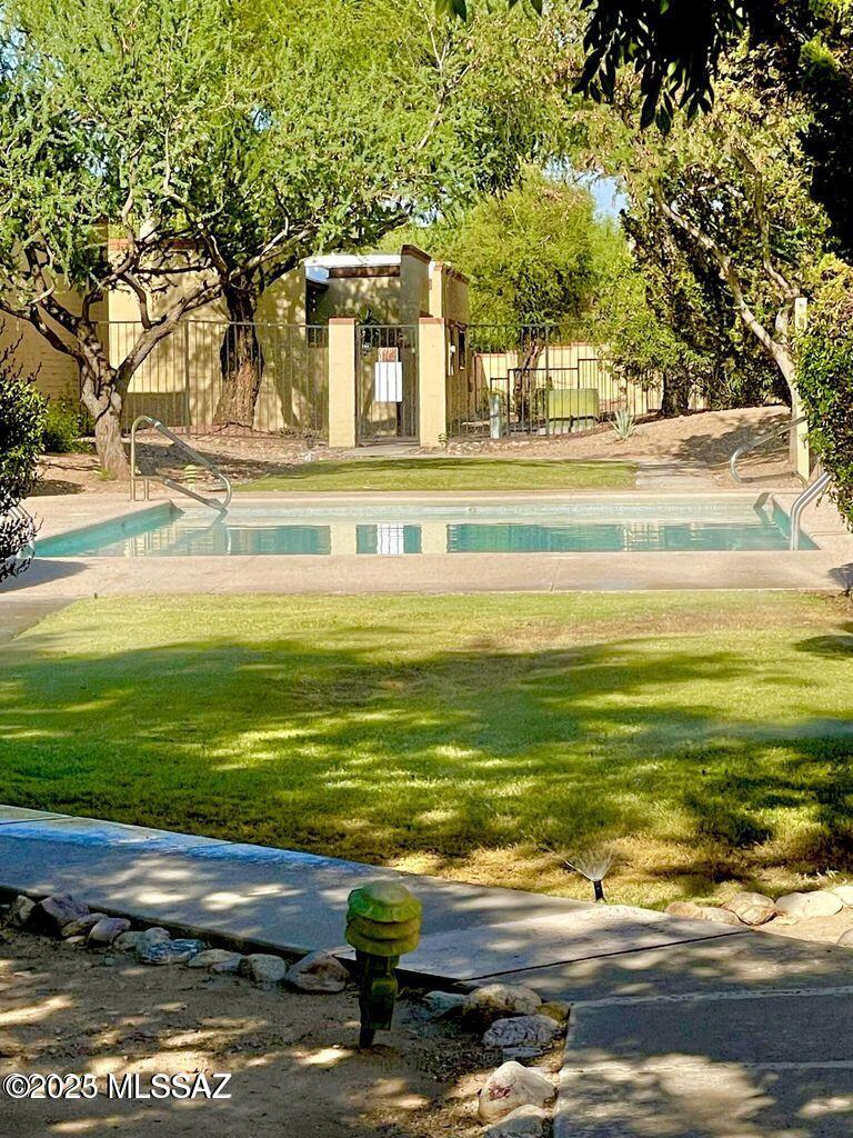 8110 East Rivenoak Circle Tucson, AZ 85715 - Photo 29 of 29 a view of a swimming pool with an outdoor space