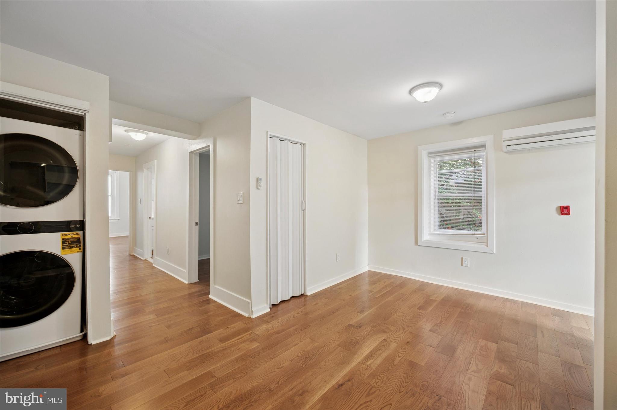 237 Roxborough Avenue, Unit 2 Philadelphia, PA 19128 - Photo 11 of 19 a view of a bedroom with washer and dryer
