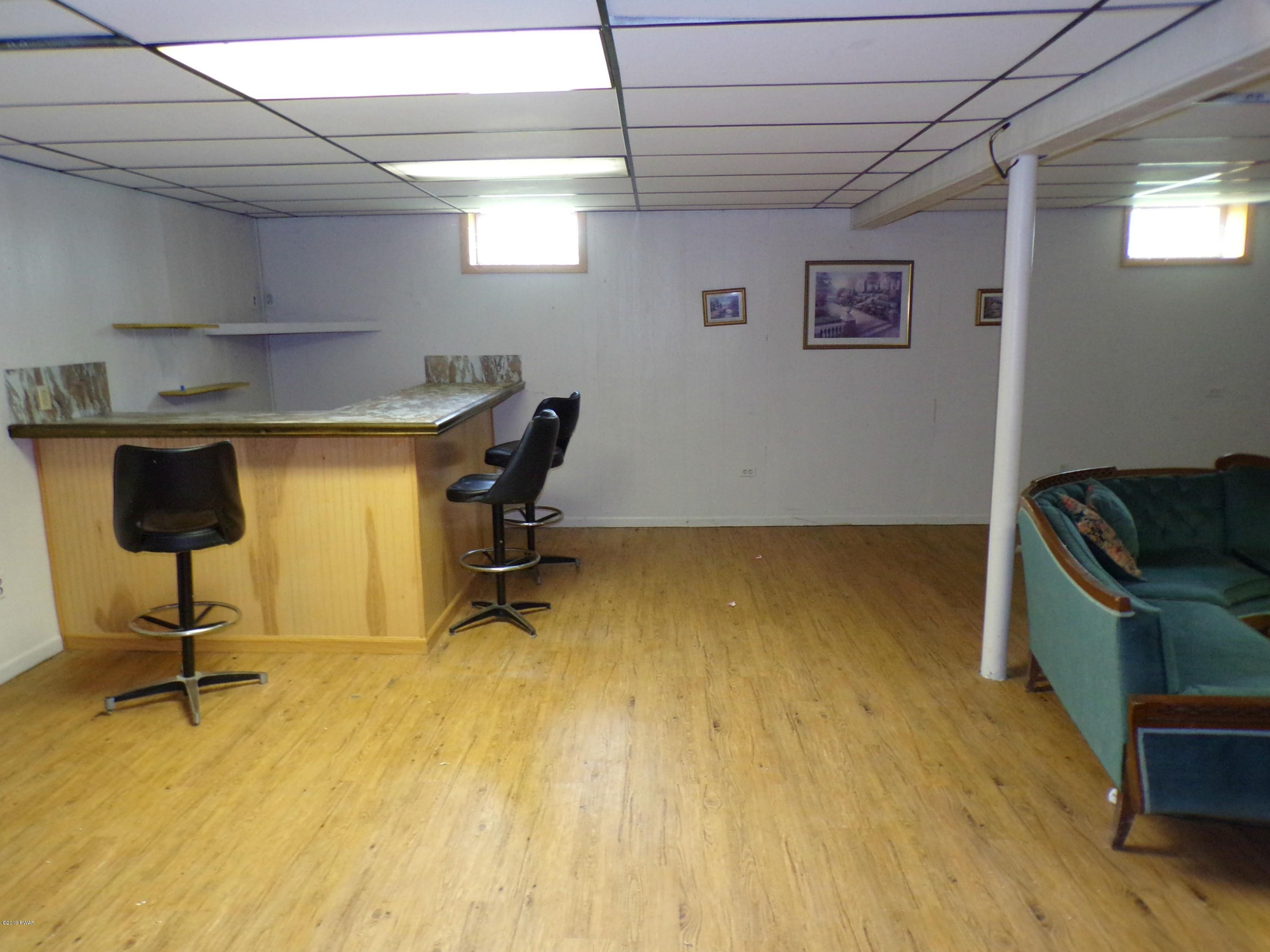 27 Little Beach Lake Road Beach Lake, PA 18405 - Photo 12 of 14 Basement Bar