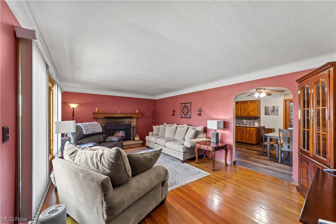 8151 Ridge Road North Royalton, OH 44133 - Photo 7 of 29 Family room featuring oak floors and a fireplace