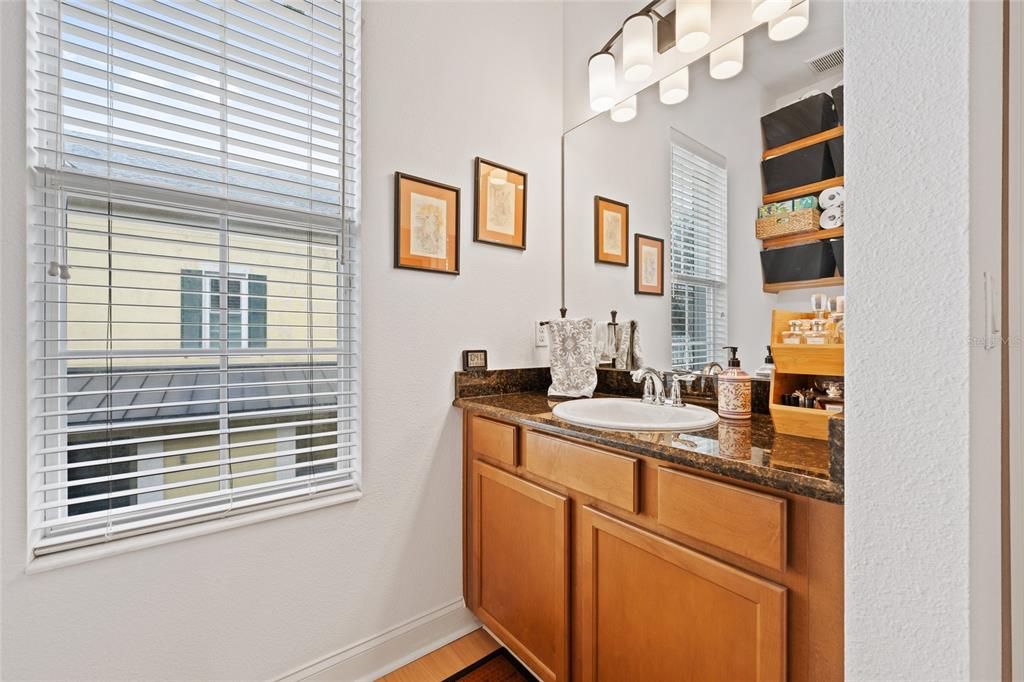 1819 Common Way Road, Unit 203 Orlando, FL 32814 - Photo 18 of 23 a kitchen with a sink cabinets and window